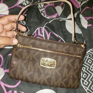 Wristlet MK purse.